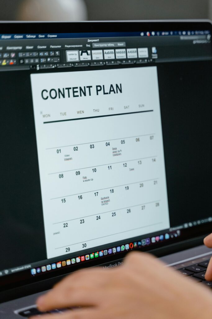 Close-up of digital content plan on laptop screen, ideal for scheduling visuals.